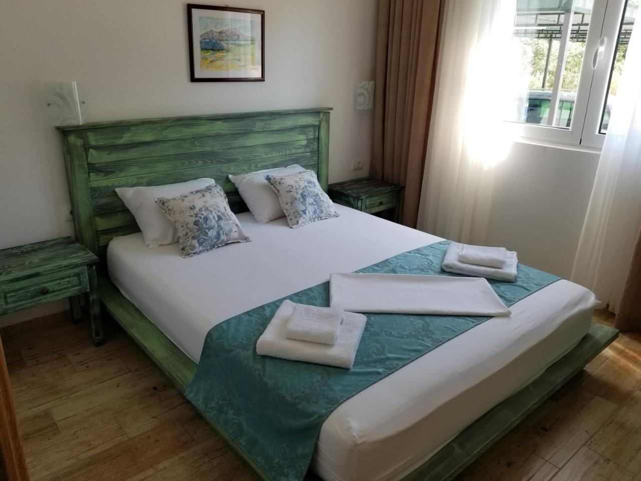 Riviera Inn Apartments อุลซิน ภายนอก รูปภาพ