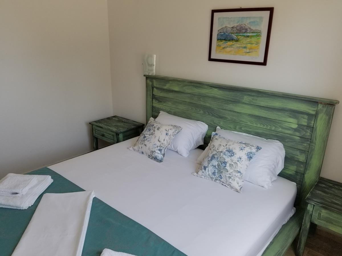 Riviera Inn Apartments อุลซิน ภายนอก รูปภาพ
